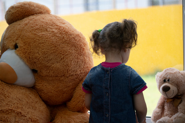 Child with Teddy Bear